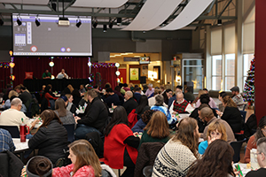 Photo of staff gathering in cafeteria to play bingo