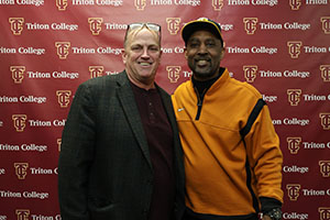 Lance Johnson posing with Alumni Member