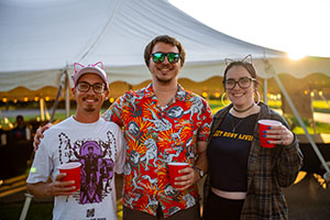 Glow Golf golfers enjoying Happy Hour