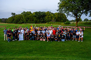 Group photo of all attendees at the 2025 Glow Golf outing